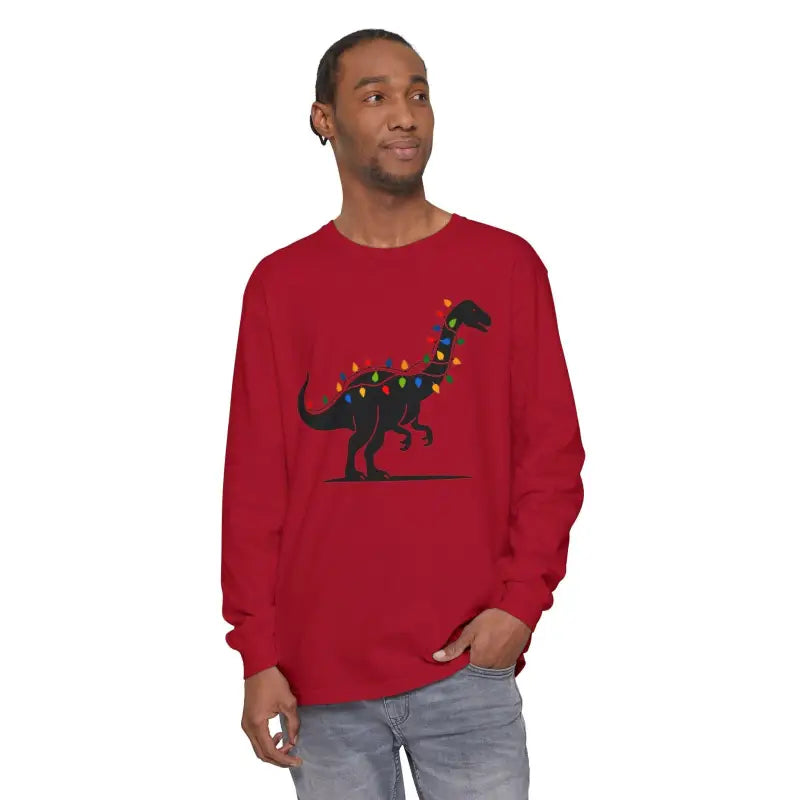 Red long-sleeved shirt featuring dinosaur design with Christmas lights for festive style