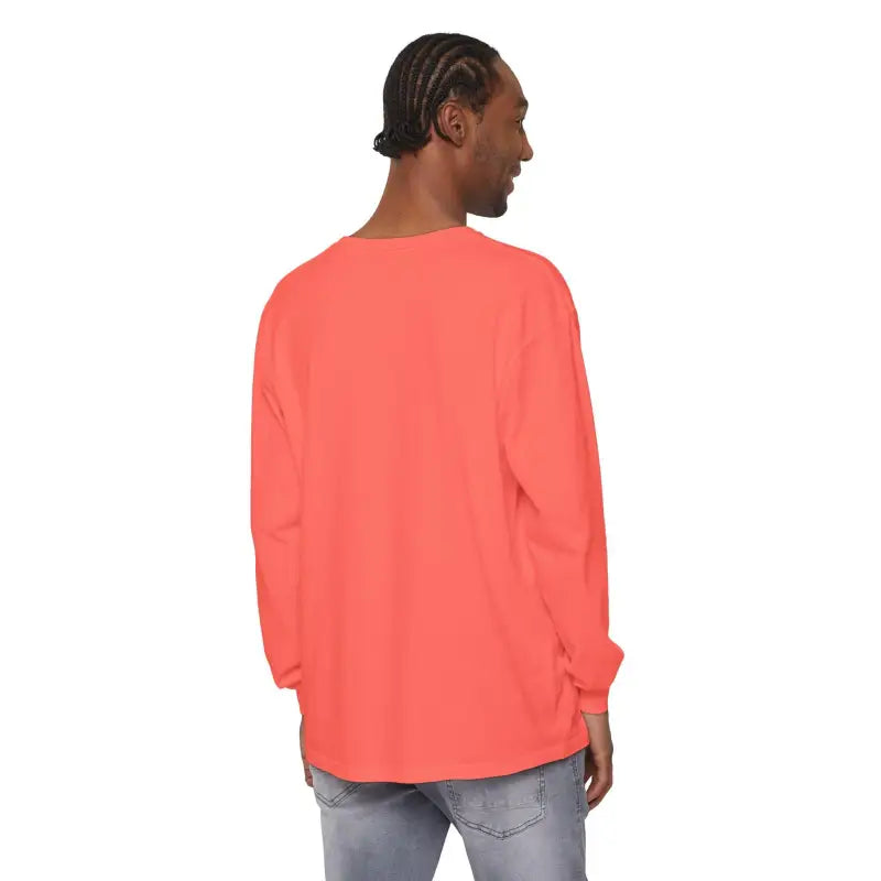 Coral long-sleeved shirt featuring a Christmas dinosaur and lights design