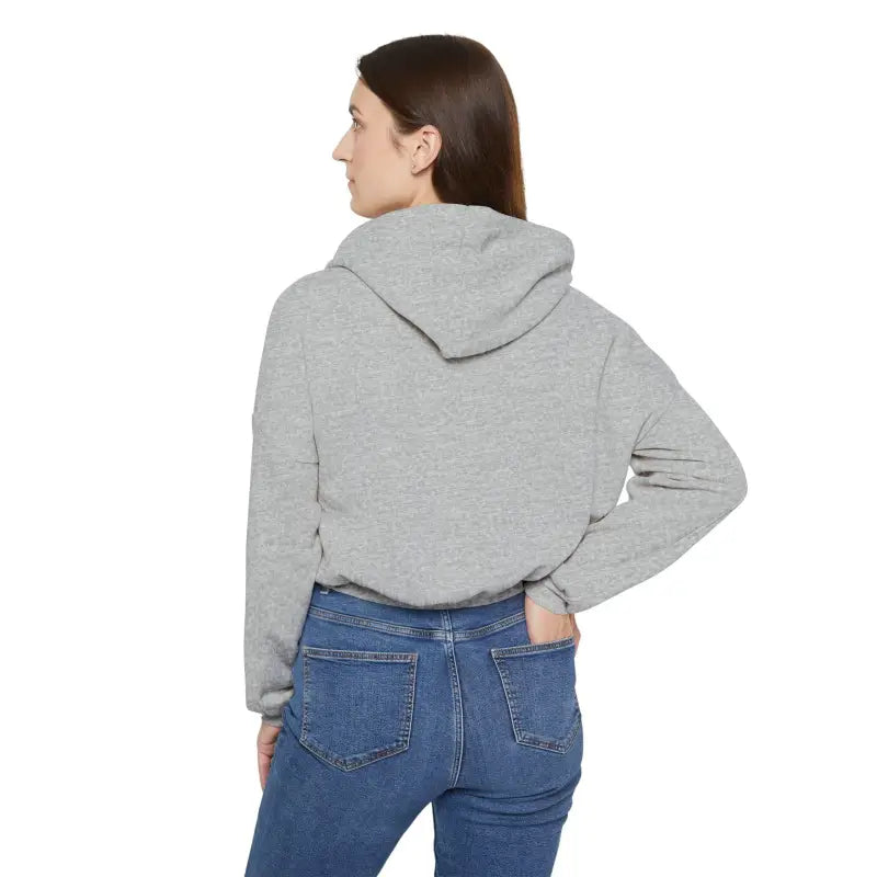 Woman wearing Coexist Women’s Cinched Bottom Hoodie in Olive Green, Black, and Beige