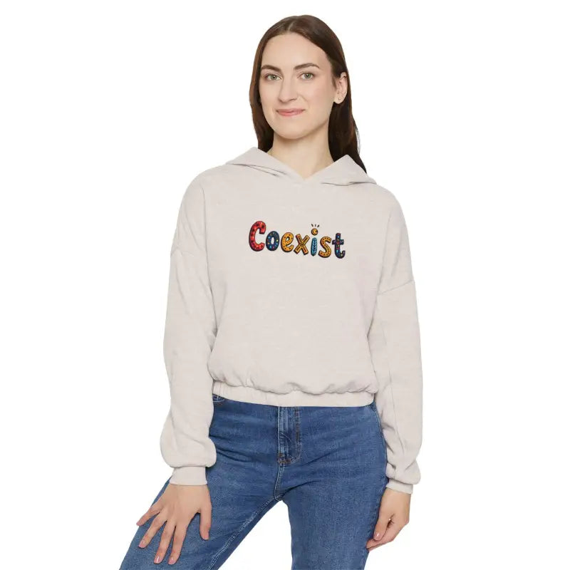 Woman in Coexist Women’s Cinched Bottom Hoodie, Olive Green, Black, and Beige