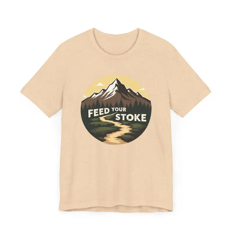 Beige t-shirt featuring mountain graphic from Feed Your Stoke Unisex collection
