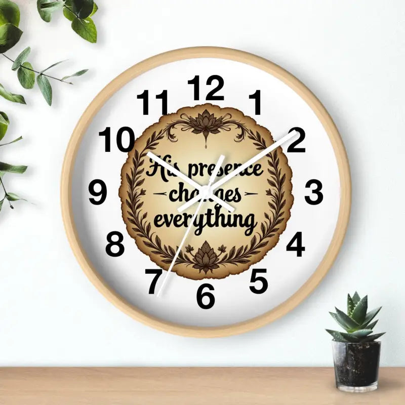 Round wooden wall clock featuring the inspirational message His Presence Changes Everything