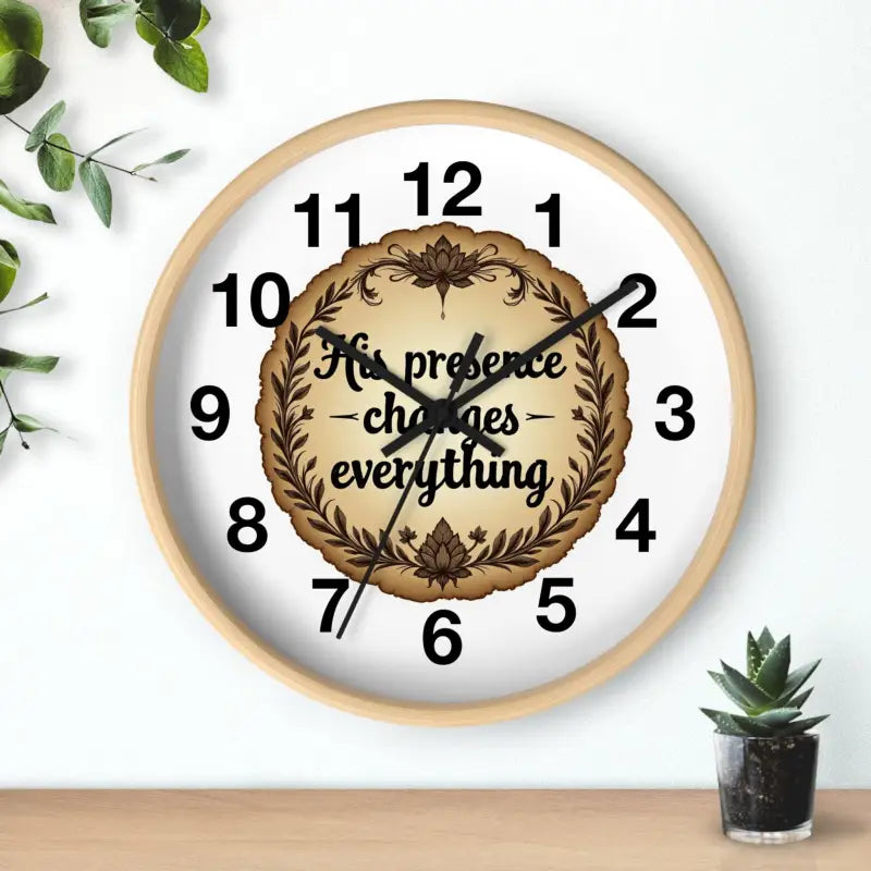 Round wooden wall clock featuring the inspirational message His Presence Changes Everything