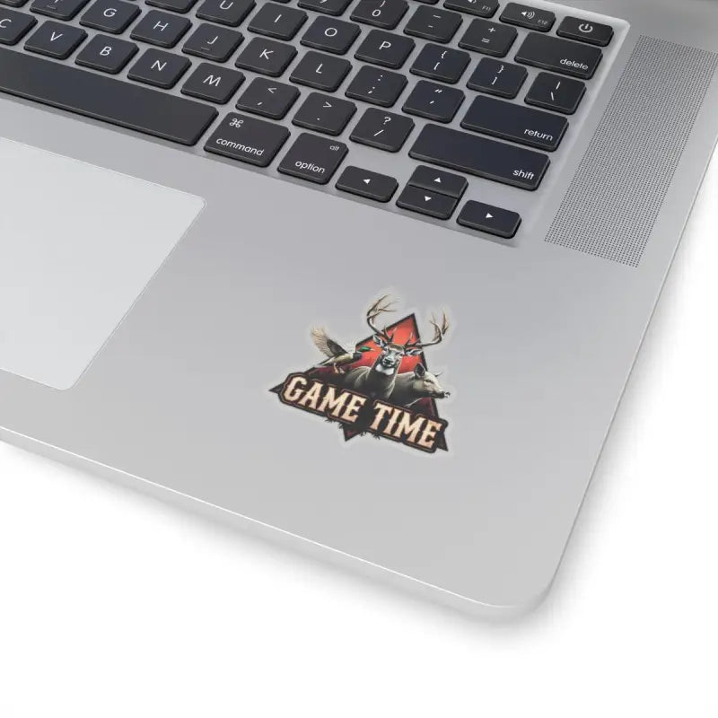 Hunting themed kiss cut sticker featuring deer, duck, and boar designs on a laptop