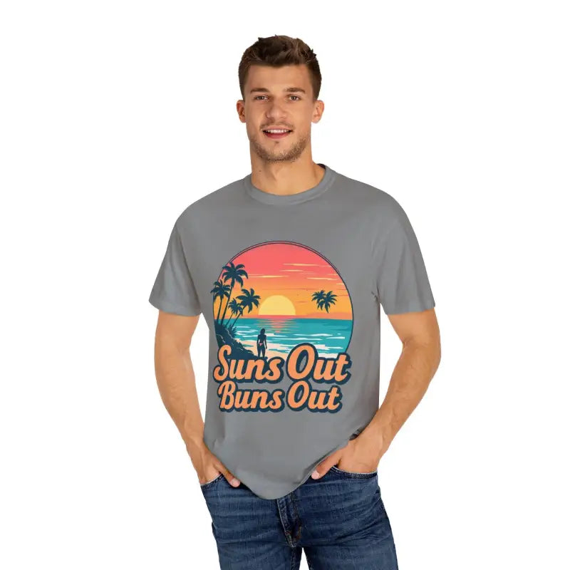 Man wearing Suns Out Buns Out Unisex Garment Dyed Summer T Shirt in vibrant colors