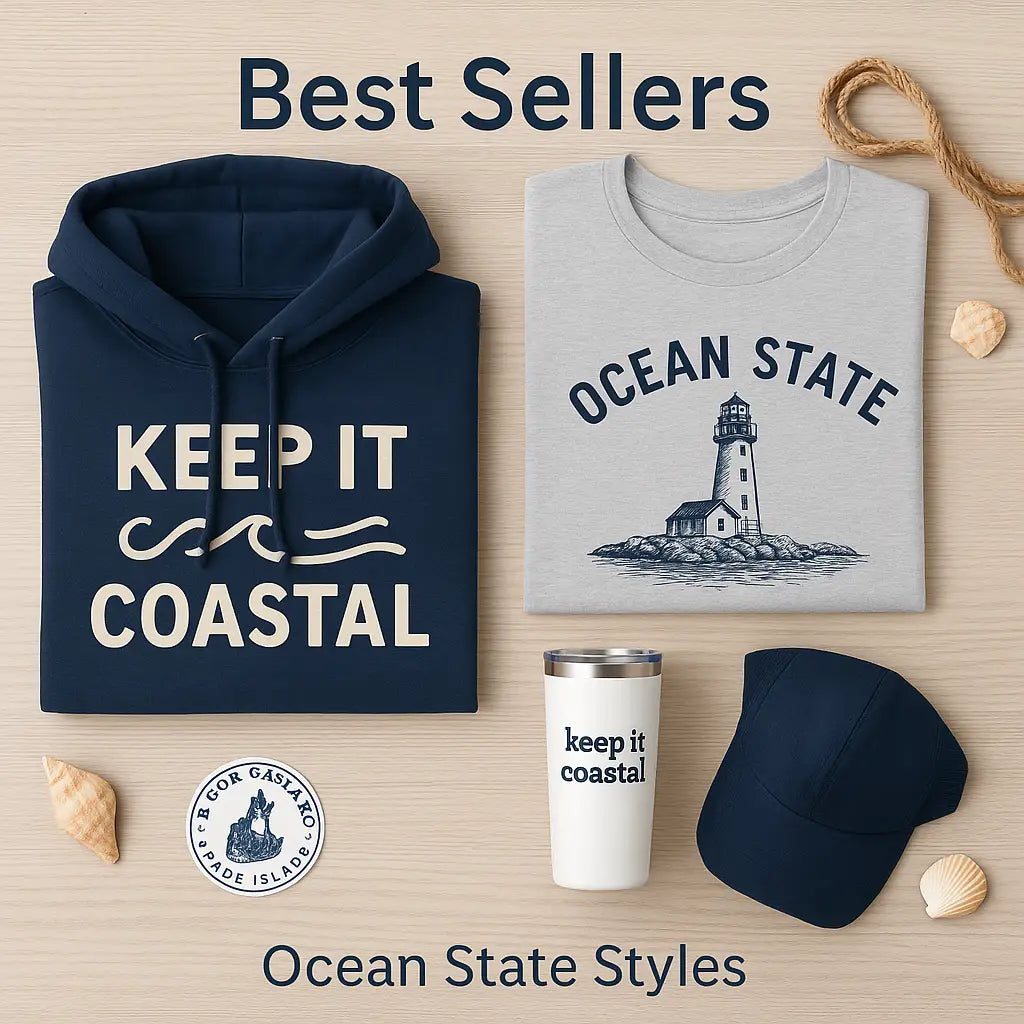 laid navy hoodie, gray tshirt, stickers, shells, and a tumbler