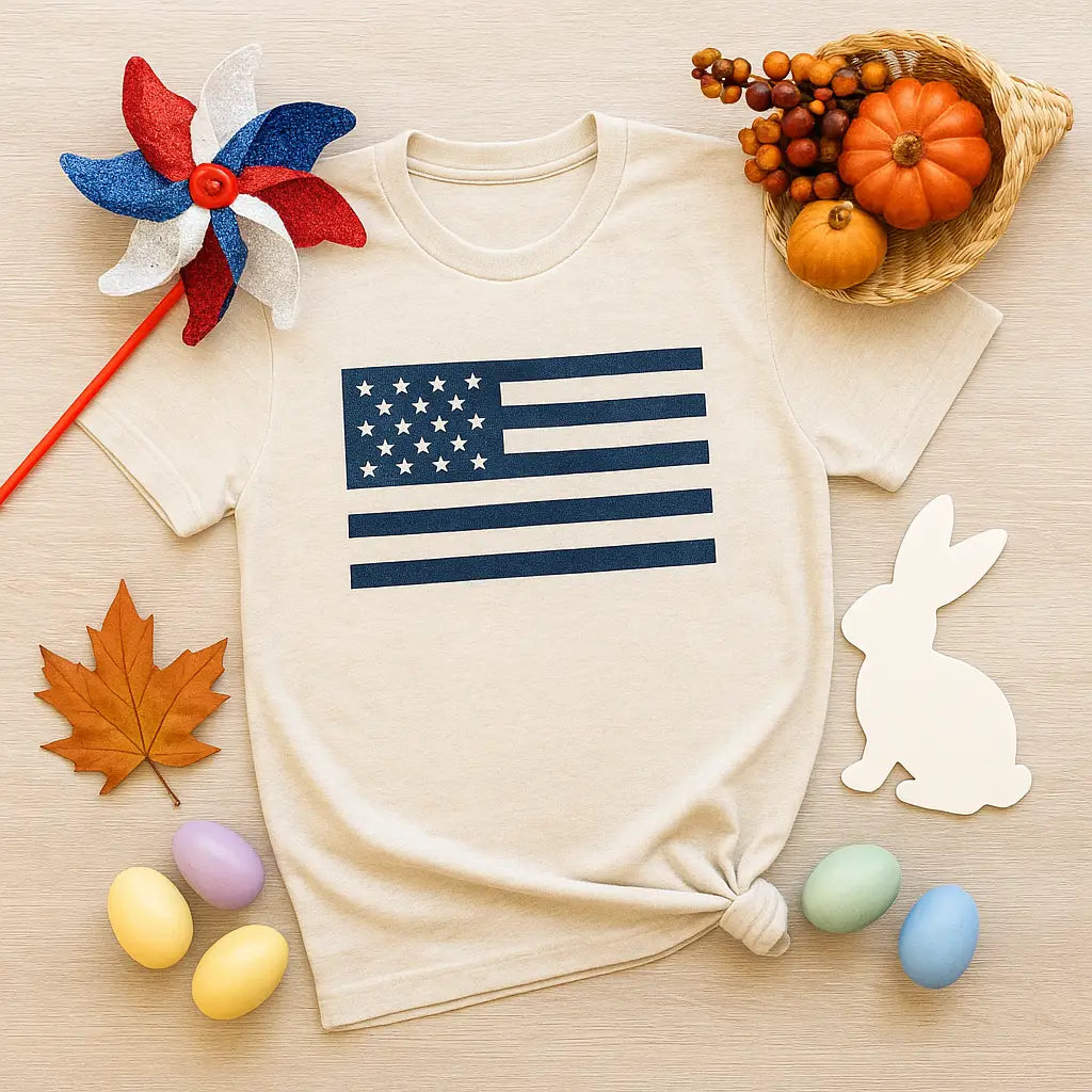 laying white tshirt, many different holiday small trinkets noted 