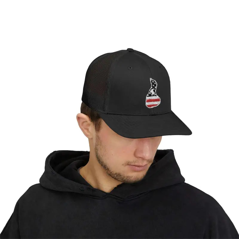 Black trucker hat featuring American flag-themed Martha’s Vineyard embroidery design