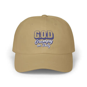 Tan baseball cap with G.O.D. Grampy on Duty in blue and white lettering