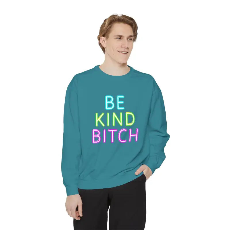 Teal Be Kind Unisex Sweatshirt featuring vibrant neon text design