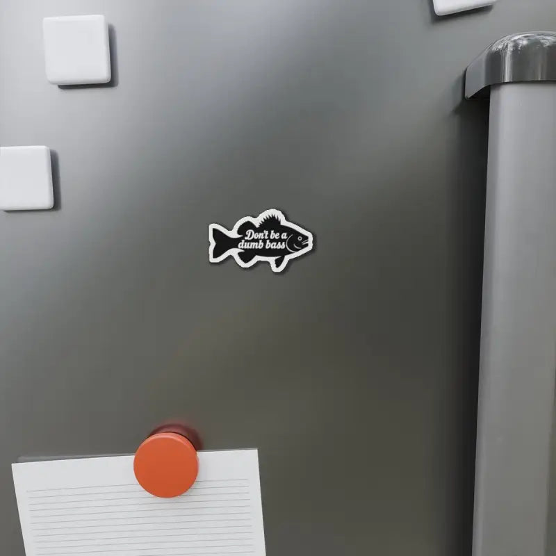 Fish-shaped magnet featuring a black design with a white border for home decor