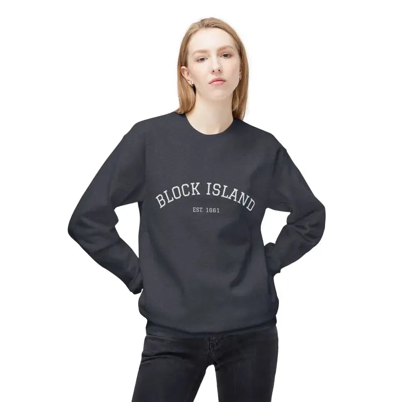 Woman wearing a dark gray Block Island EST 1661 long-sleeve sweatshirt and black jeans