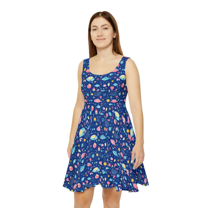 Woman wearing a blue space-themed dress, ideal for colorful summer celebrations