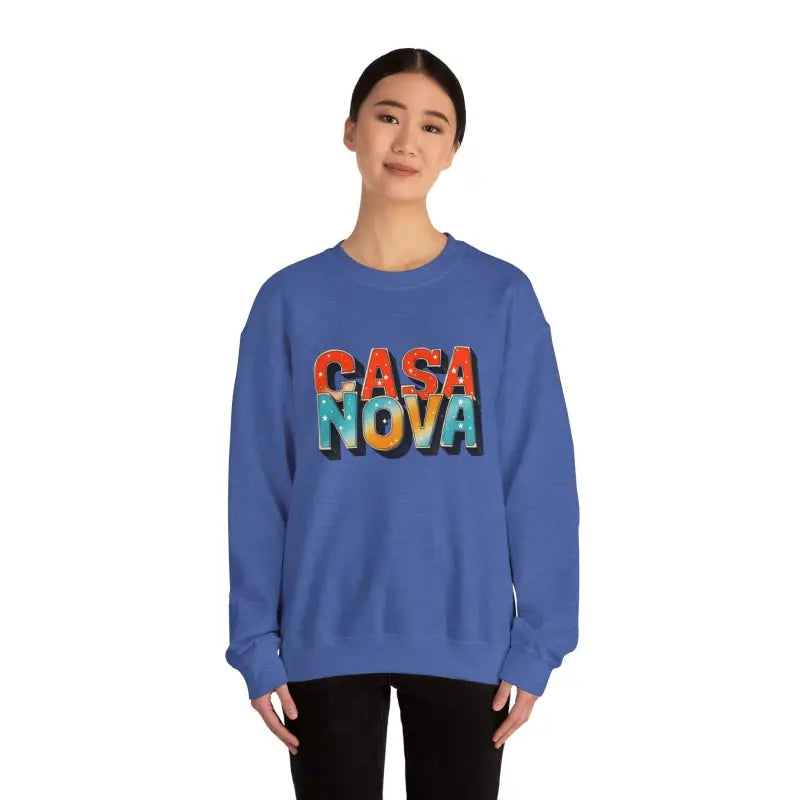 Woman wearing a blue Casa Nova sweatshirt from the Casa Nova Colorful Lettering Crewneck Top collection