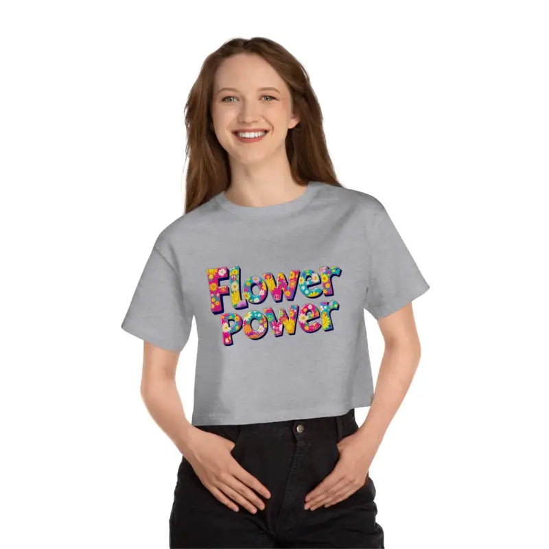 Light grey women’s crop top with colorful Flower Power graphic from Champion