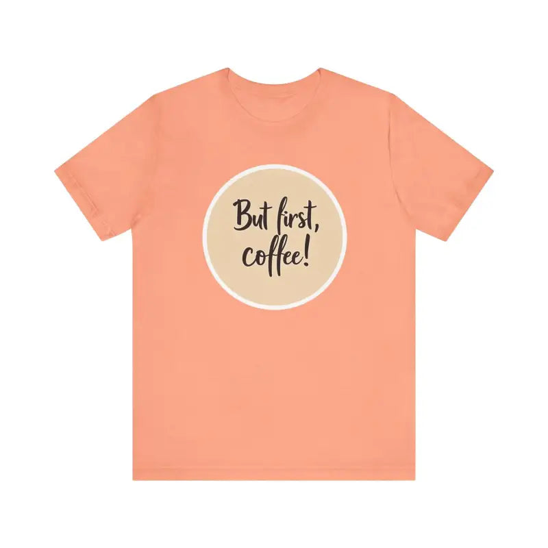 Peach-colored Coffee Lover Tee featuring But first, coffee! design for unisex wear