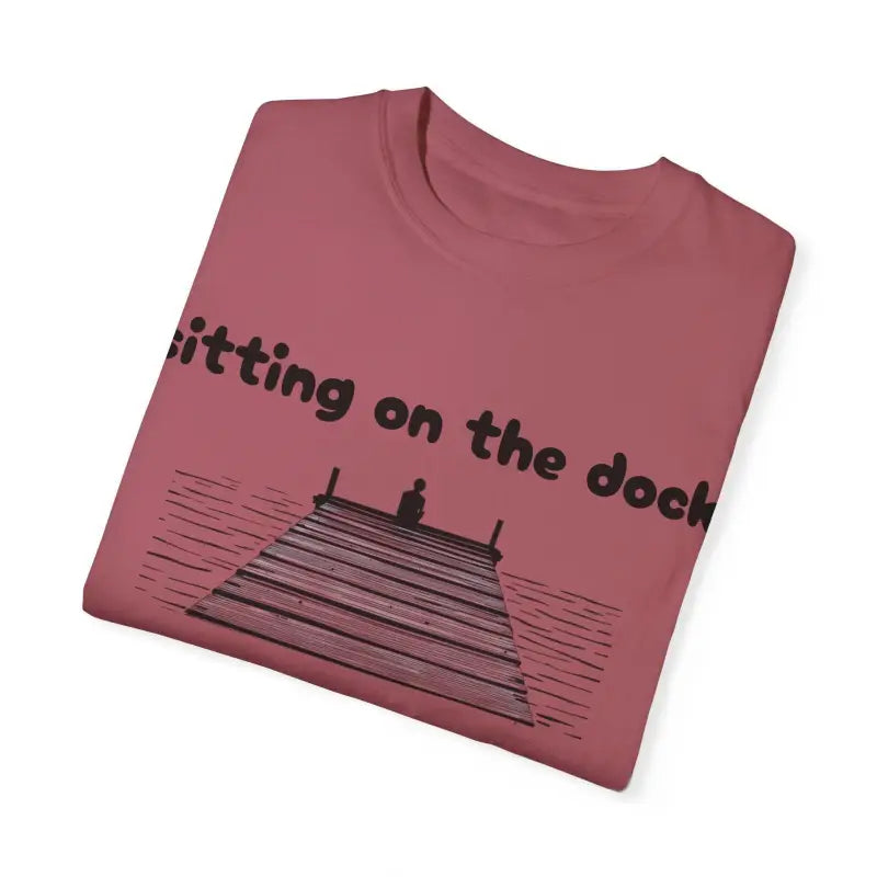 Folded Dock Of The Bay Graphic T Shirt showcasing a vibrant dock-inspired design