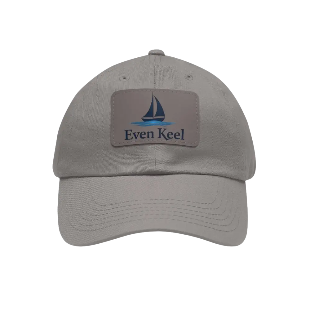 Gray baseball cap featuring a sailboat patch from Even Keel branded Dad Hat collection