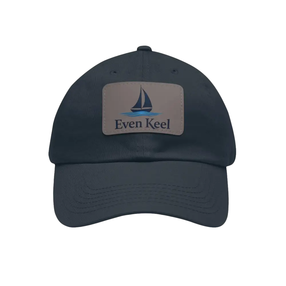 Navy blue baseball cap featuring a sailboat patch from Even Keel Branded Dad Hat