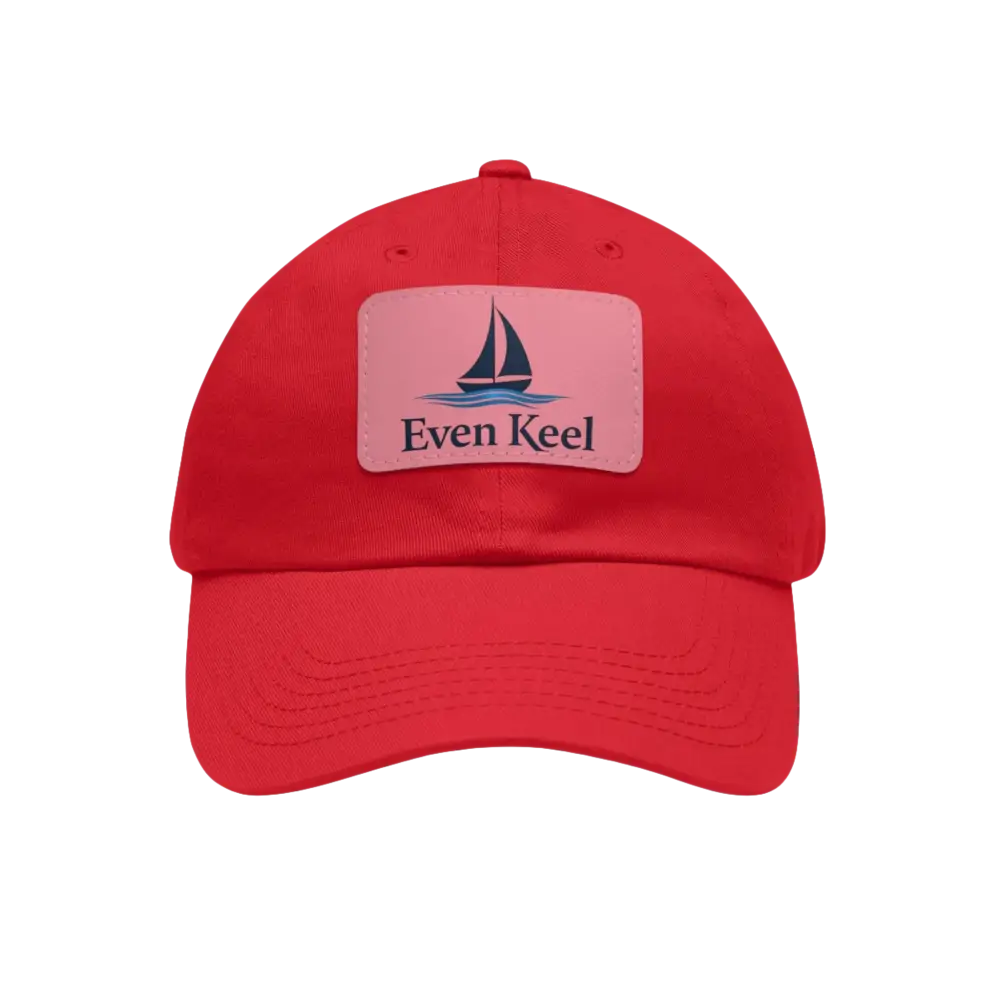 Red baseball cap featuring a sailboat patch from Even Keel Branded Dad Hat collection