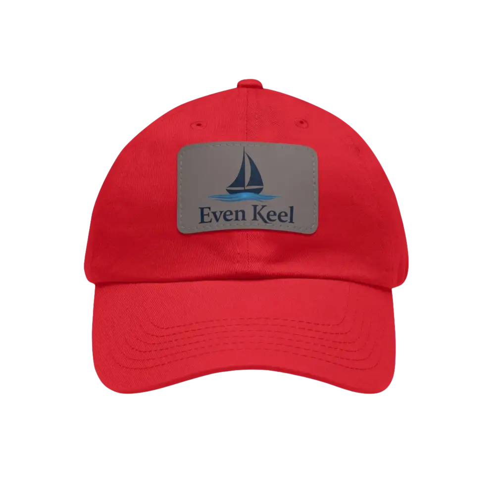 Red baseball cap featuring a sailboat patch from Even Keel Branded Dad Hat collection