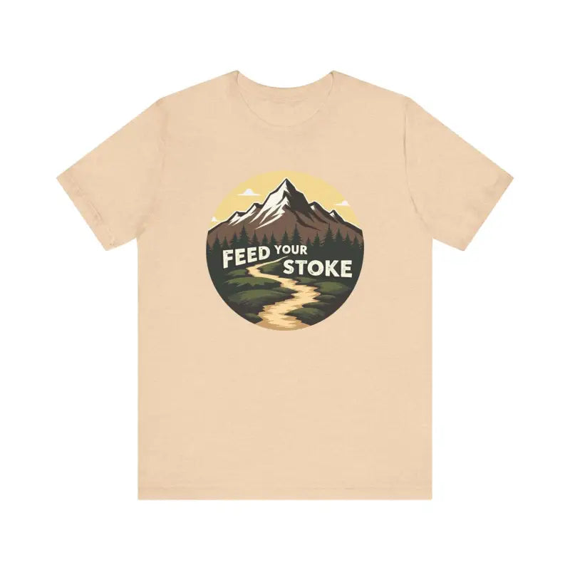 Beige t-shirt featuring a mountain graphic from Feed Your Stoke collection