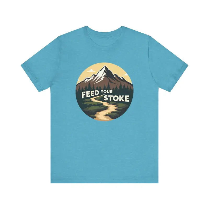 Teal t-shirt featuring a mountain graphic from the Feed Your Stoke collection
