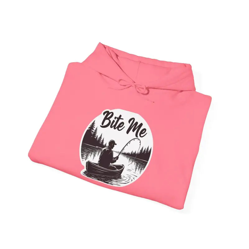 Folded pink hoodie with fishing graphic from Fishing Bite Me Unisex Heavy Blend Hoodie
