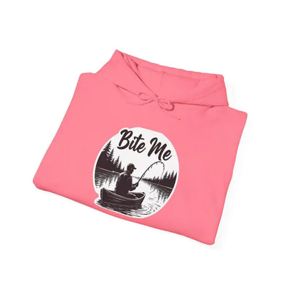 Folded pink hoodie with fishing graphic from Fishing Bite Me Unisex Heavy Blend Hoodie