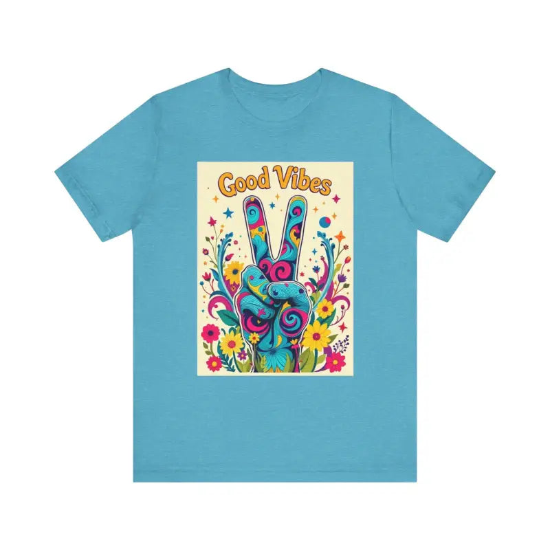 Light blue Good Vibes unisex jersey tee featuring a colorful peace flower design