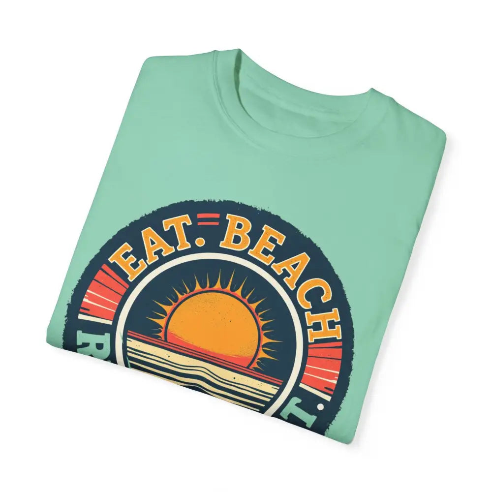 Folded mint-green t-shirt from Island Reef Unisex Garment Dyed Eat Beach Relax Repeat Tee