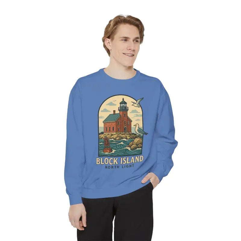 Man modeling a blue long-sleeved sweatshirt with Block Island North Light graphic