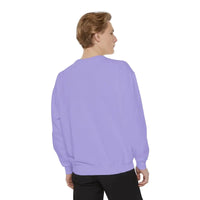 Man wearing lavender long sleeve crewneck sweatshirt with lighthouse and seagulls graphic