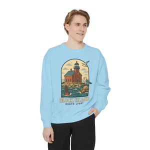 Light blue long-sleeved crewneck sweatshirt with lighthouse and seagulls graphic