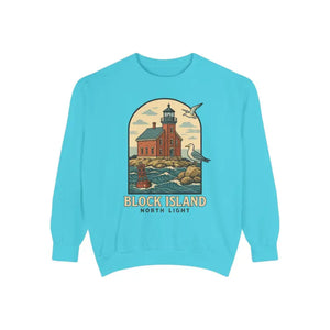 Bright blue long-sleeved sweatshirt with a Block Island North Light lighthouse graphic