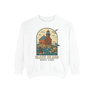 White long-sleeve crewneck sweatshirt with colorful lighthouse and ocean graphic