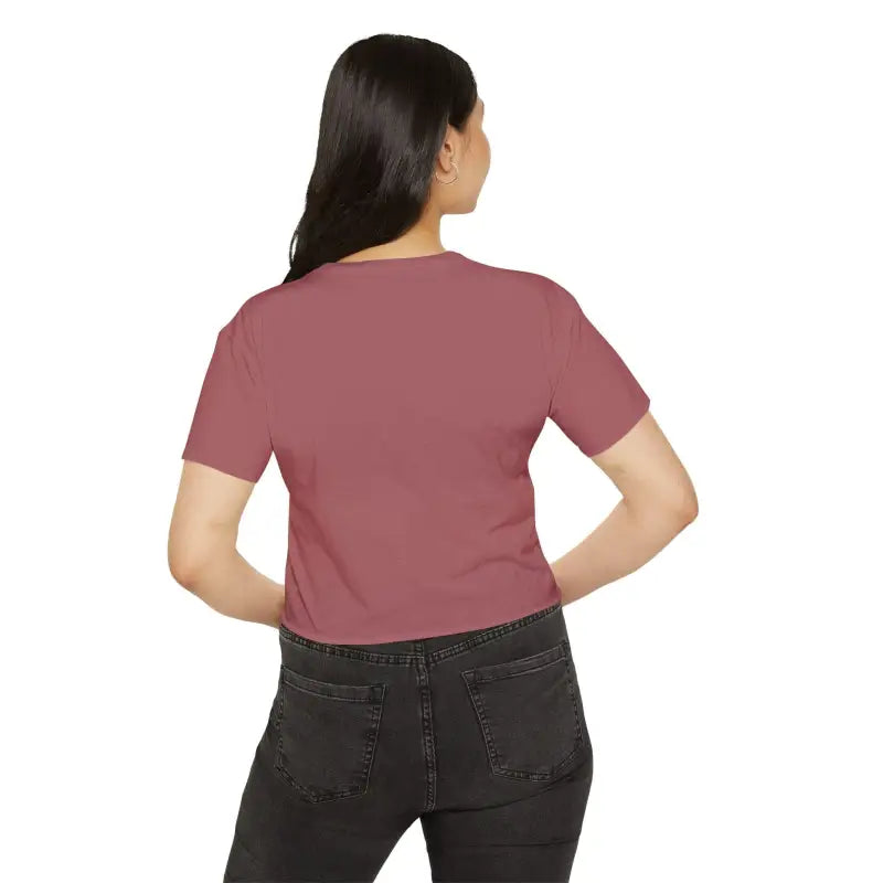 Woman in a mauve Mama Crop Top paired with black jeans for stylish moms