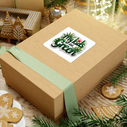 Gift box featuring My Kids Are Green sticker with plant illustrations for eco-friendly gifts
