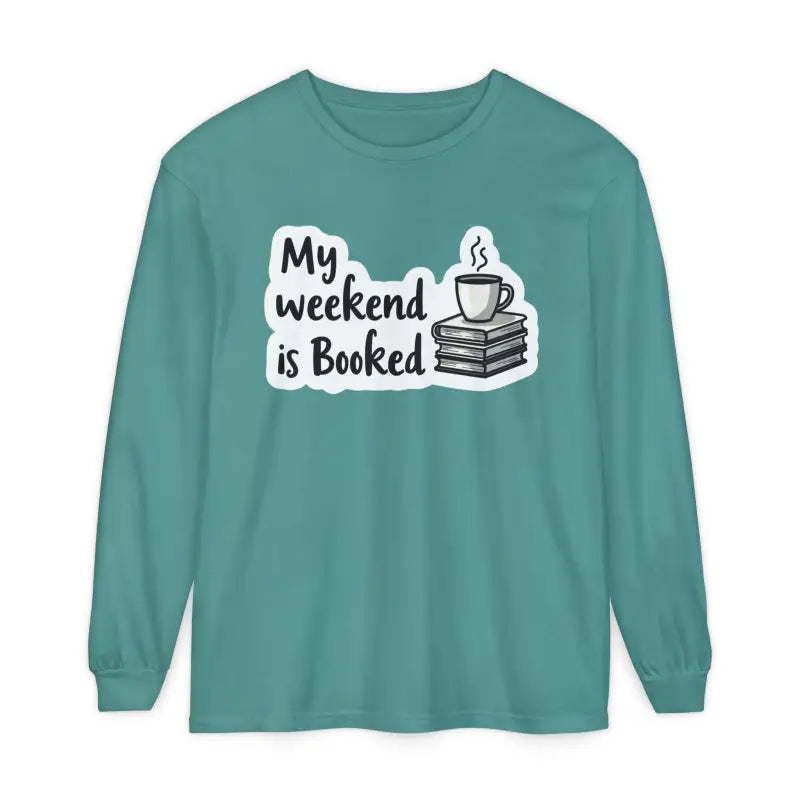 Teal long-sleeved shirt featuring a book and coffee graphic for My Weekend is Booked