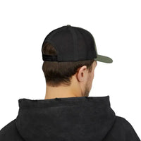 Black baseball cap with green brim, mesh back, and rock climbing design