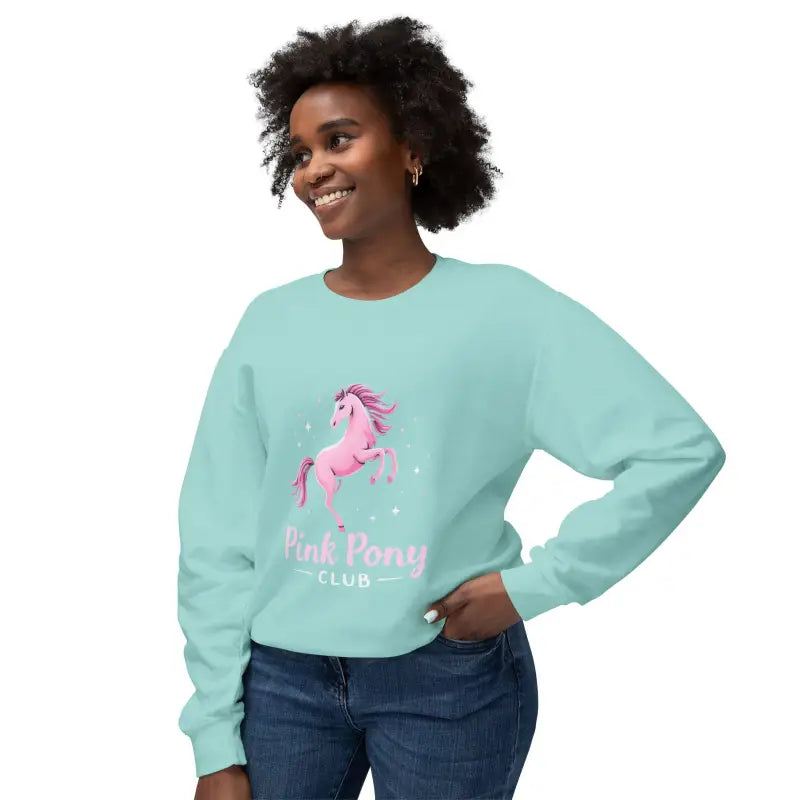 Woman wearing light blue long-sleeved sweatshirt with pink pony graphic from Pink Pony Graphic Crewneck Sweatshirts