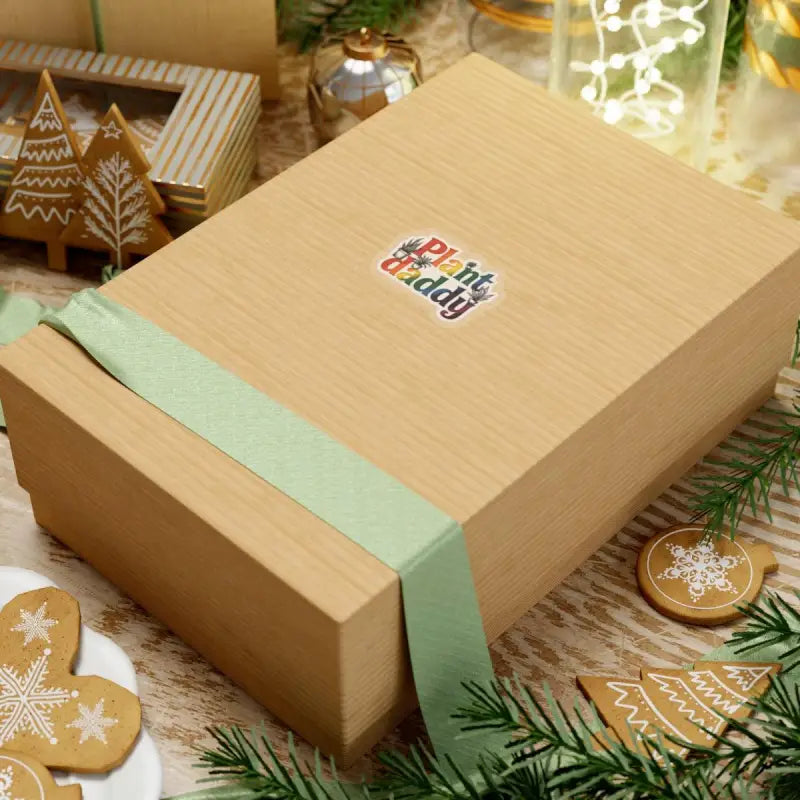 Wrapped gift box accompanying Plant Daddy Rainbow Sticker featuring potted plants