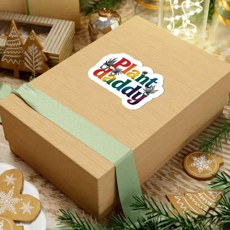 Gift box featuring Plant Daddy sticker on a colorful product with potted plants
