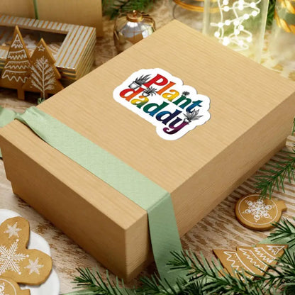 Gift box featuring Plant Daddy sticker on a colorful product with potted plants