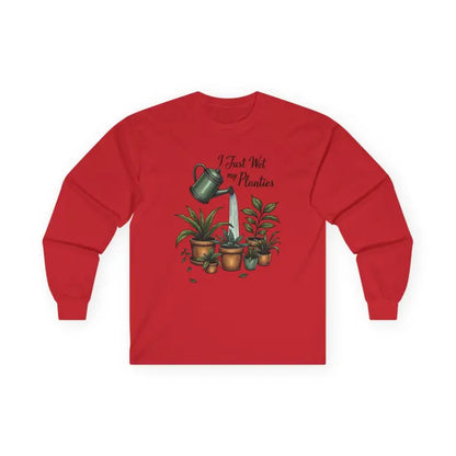 Red long-sleeved shirt featuring plant watering graphic from Plant Lover Long Sleeve Tee