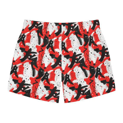 Stylish Splash Swim Trunks featuring a vibrant red, black, and white patterned design