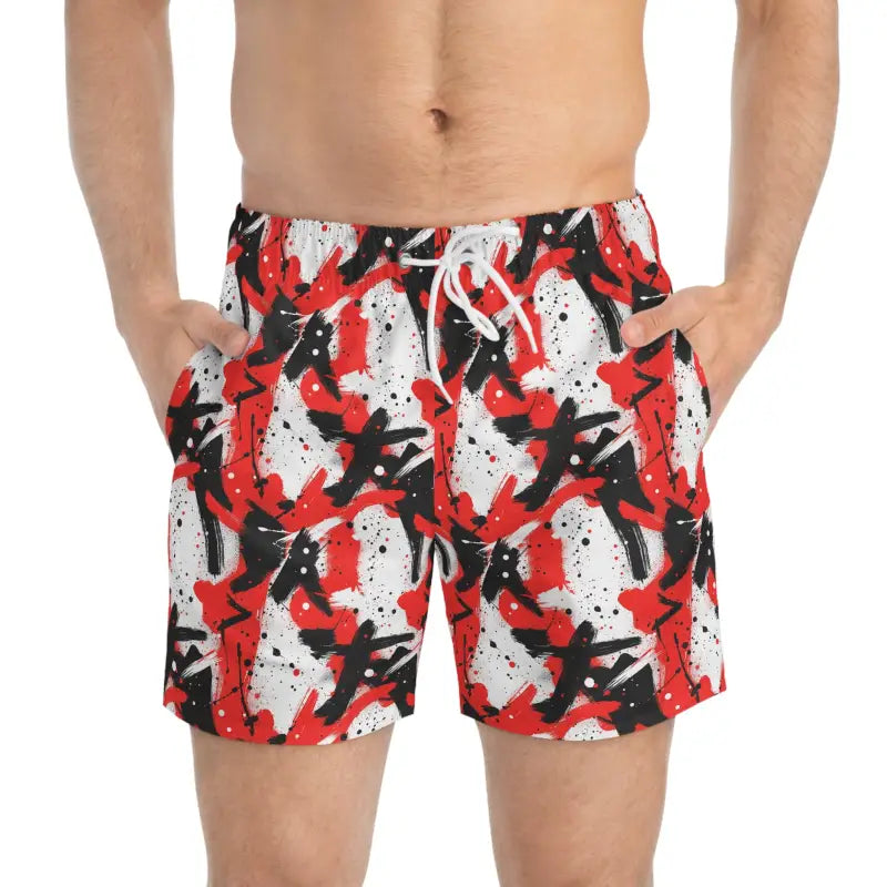 Patterned men’s swim trunks featuring vibrant red and black design from Stylish Splash collection