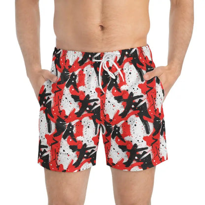Patterned men’s swim trunks featuring vibrant red and black design from Stylish Splash collection
