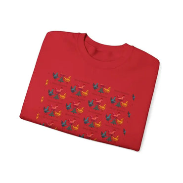 Folded red t-shirt featuring a chicken pattern for the Red Crewneck Sweatshirt