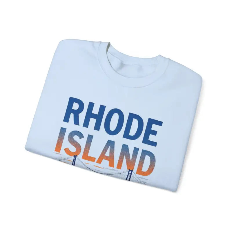 Folded white t-shirt next to Rhode Island Sunset Crewneck Sweatshirt in Black White Pink